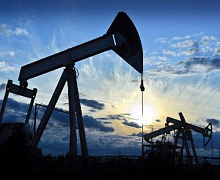 Нефть скользит по мере роста запасов бензина в США